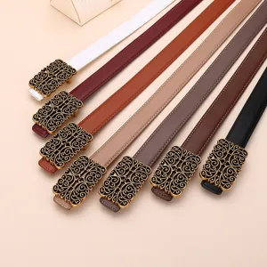 Collection of vintage ladies decorative belts with ornate gold buckles in Maillard colors