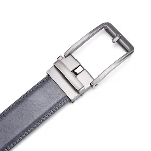 Close-up of a men's leather belt featuring a gunmetal automatic metal buckle detail