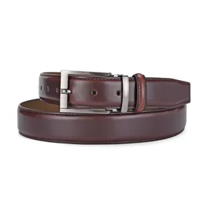 Close-up of a classic brown cowhide leather belt featuring a brushed metal buckle.