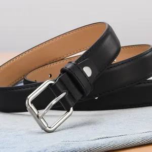 Minimalist black leather belt for women with a polished silver-tone square buckle