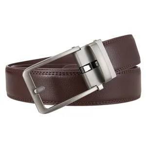Detail view of brown leather belt featuring a matte metal buckle and precision stitching
