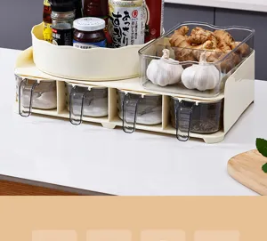 Multi-functional kitchen seasoning organizer with rotating tray and drawer compartments