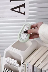 Detailed view of a white multi-functional desk organizer for books and stationery