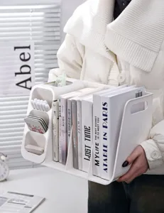 Close-up of white multi-functional desk organizer with book and stationery compartments
