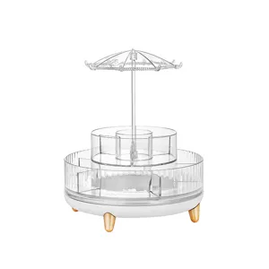 Rotating transparent cosmetic organizer with umbrella jewelry hanger and gold legs