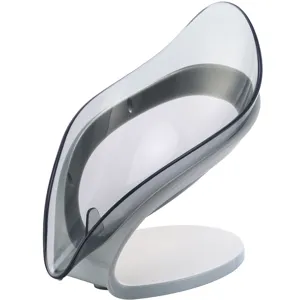 Elegante jabonera minimalista en forma de hoja con bandeja gris y base blanca