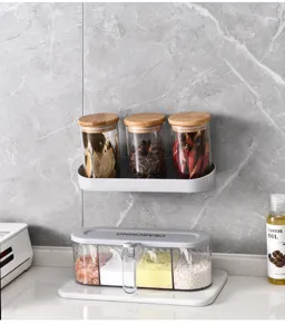 Modern wall-mounted spice rack and 4-grid seasoning box set in a clean kitchen setting.