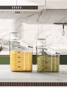Detail of two airtight transparent food storage containers for grains in kitchen.