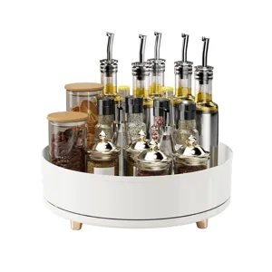 Elegant white rotating lazy susan organizer with rose gold feet for kitchen or vanity