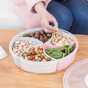 Round multi-compartment transparent snack tray with lid for nuts and dried fruits storage
