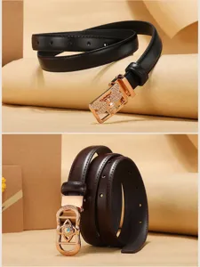 Detailed view of women's leather belts with ornate bee and geometric gold buckles
