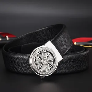 Luxury black textured leather belt for men featuring a rotating silver rhinestone cross buckle