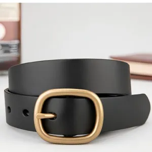 Elegant women's black genuine leather belt featuring a matte gold oval pin buckle.