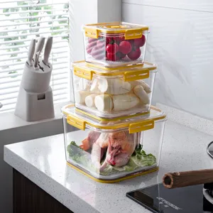 Stackable transparent plastic food storage containers with yellow airtight locking lids