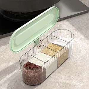 Creative wall-mounted 4-compartment seasoning box with transparent body and green lid