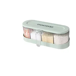 Modern multi-compartment seasoning box with a transparent body and mint green lid