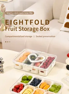 Detail of compartmentalized fruit storage box with clear lid and heart-shaped handle.