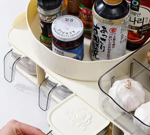 Multi-tier kitchen spice organizer with pull-out drawers for fresh garlic storage