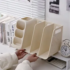 Close-up view of a cream plastic desktop organizer showing file dividers and pen holders.