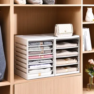 White stackable plastic clothing organizer racks for wardrobe and closet storage