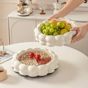 Elegant cloud-shaped rotating snack and fruit tray with compartments and decorative bow handle