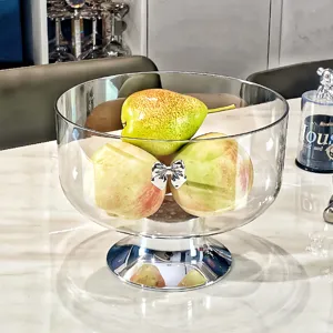 Coupe à fruits élégante en verre transparent avec nœud argenté et base chromée