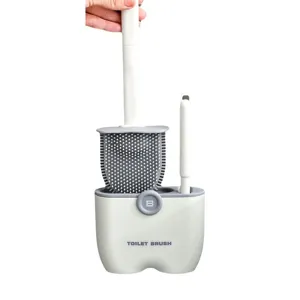 Modern silicone toilet brush set with wall-mounted holder and dual cleaning heads for bathrooms