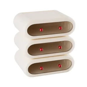 Three-tier cream desktop drawer organizer with transparent drawers and red knobs.