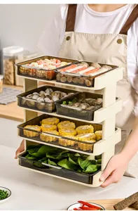 Detail showing 4-tier kitchen prep rack with transparent trays for food storage