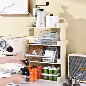 Detailed macro view of 3-tier desktop organizer for coffee capsules and tea bags
