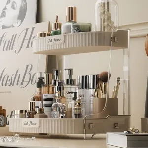 Elegante cosmetica-organizer met 2 niveaus, crème, geribbelde textuur en zijpanelen van acryl