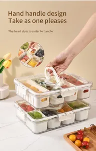 Detailed macro view showing the ergonomic heart-shaped handle of the divided food box