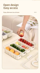 Usage scene of a food-grade multi-compartment fridge storage box filled with fresh fruits