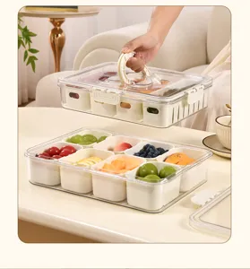 Detail view of a divided food-grade fruit storage box showing the handle and inner containers