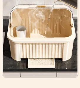 Close-up detail view of cream-colored kitchen dish drying rack with clear dustproof cover