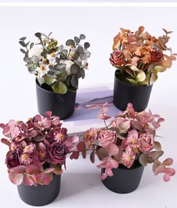 Retro artificial flower potted plant, rose and chamomile bonsai, desktop decoration props for home.