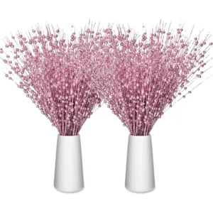 Sparkling pink glitter berry stems in elegant white vases for Valentine's Day decor