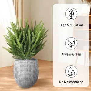 Detailed view of realistic artificial evergreen plant with ground nail design