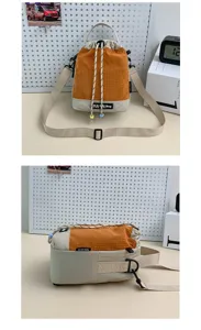 Casual grid bucket bag with drawstring closure, adjustable shoulder strap, and portable design.