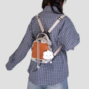 Back view of a trendy grid mini backpack with cute cloud pendant, perfect for daily use.