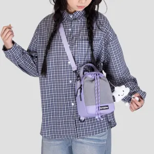 Trendy mini drawstring backpack, purple and grey canvas sling bag for daily outdoor travel use.