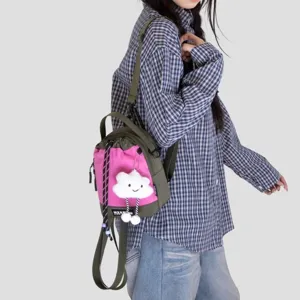 Trendy contrast color mini backpack with cute cloud plush pendant, perfect for daily casual outings.