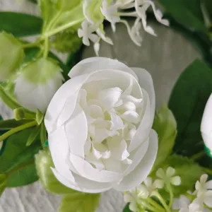 Detailed macro view of white silk tea rose petals for elegant floral table wreaths
