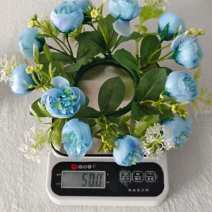 Detail weight measurement showing 50g for sky blue tea rose and gypsophila ring