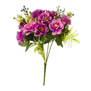 Close-up detail of vibrant purple artificial rose bouquet with lifelike green foliage