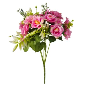 Detailed view of artificial pink roses bouquet with green leaves on white background