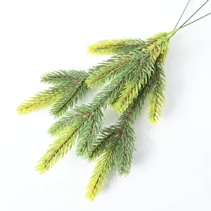 Close-up detail of artificial green pine branches for Christmas DIY wreath decor