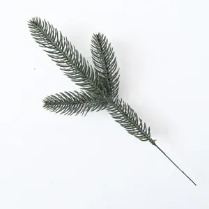 Detail of artificial green pine branch for DIY Christmas wreath decorations
