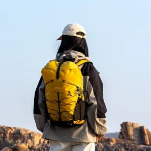 Yellow waterproof hiking backpack for outdoor sports and travel with a large capacity design