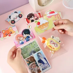 Cute cartoon packaging header cards with various animal and character designs for gifts.